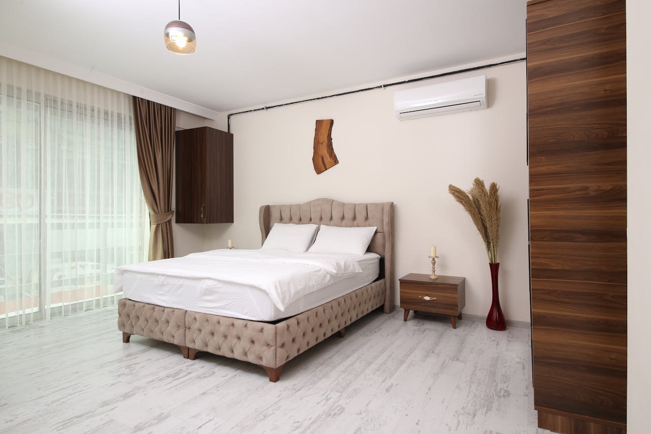Bright and airy modern bedroom in Istanbul with minimalist design and luxury amenities.